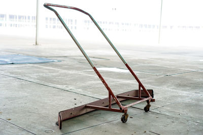 Close-up of old metal structure on floor