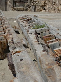 High angle view of narrow walkway along built structures