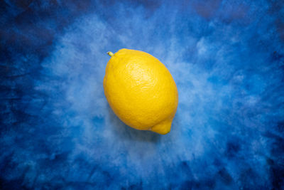 Lemon on blue background