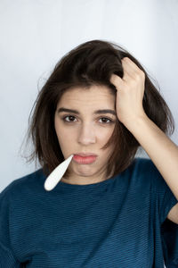 Portrait of woman suffering from fever