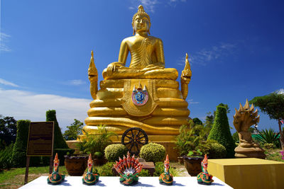 Statue of temple against sky