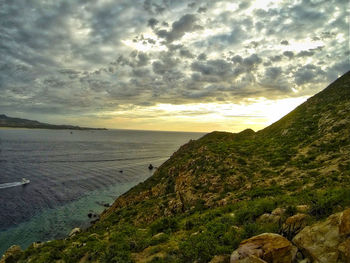 Scenic view of sea against sky during sunset