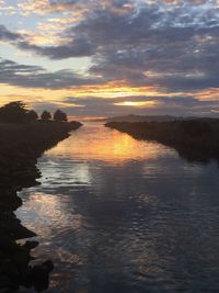 Scenic view of sea against sky during sunset