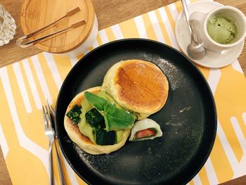 High angle view of breakfast served on table