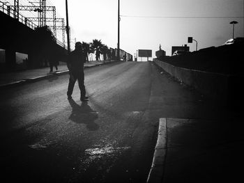 People walking on road in city