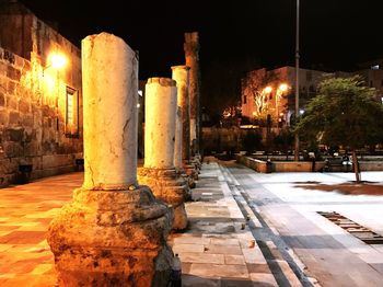 Illuminated street lights at night