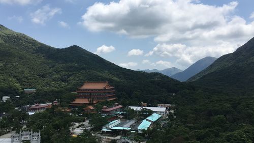 High angle view of houses and buildings against sky