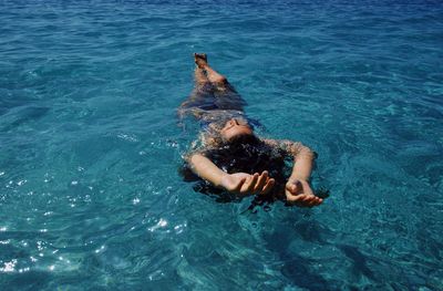 Man swimming in sea