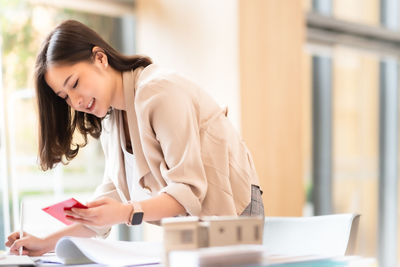 Young woman using mobile phone