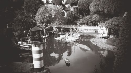 View of boats moored in calm lake