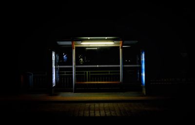 Illuminated subway train at night