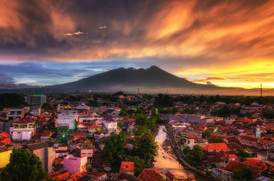 High angle view of townscape against sky during sunset