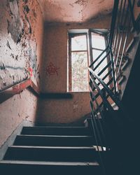 High angle view of staircase in abandoned building