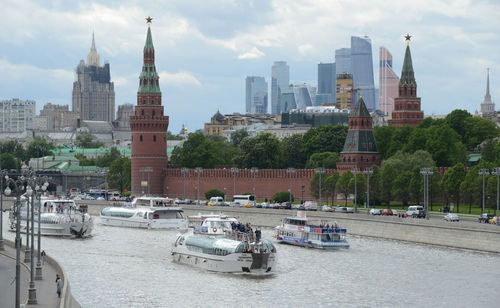 View of buildings against cloudy sky