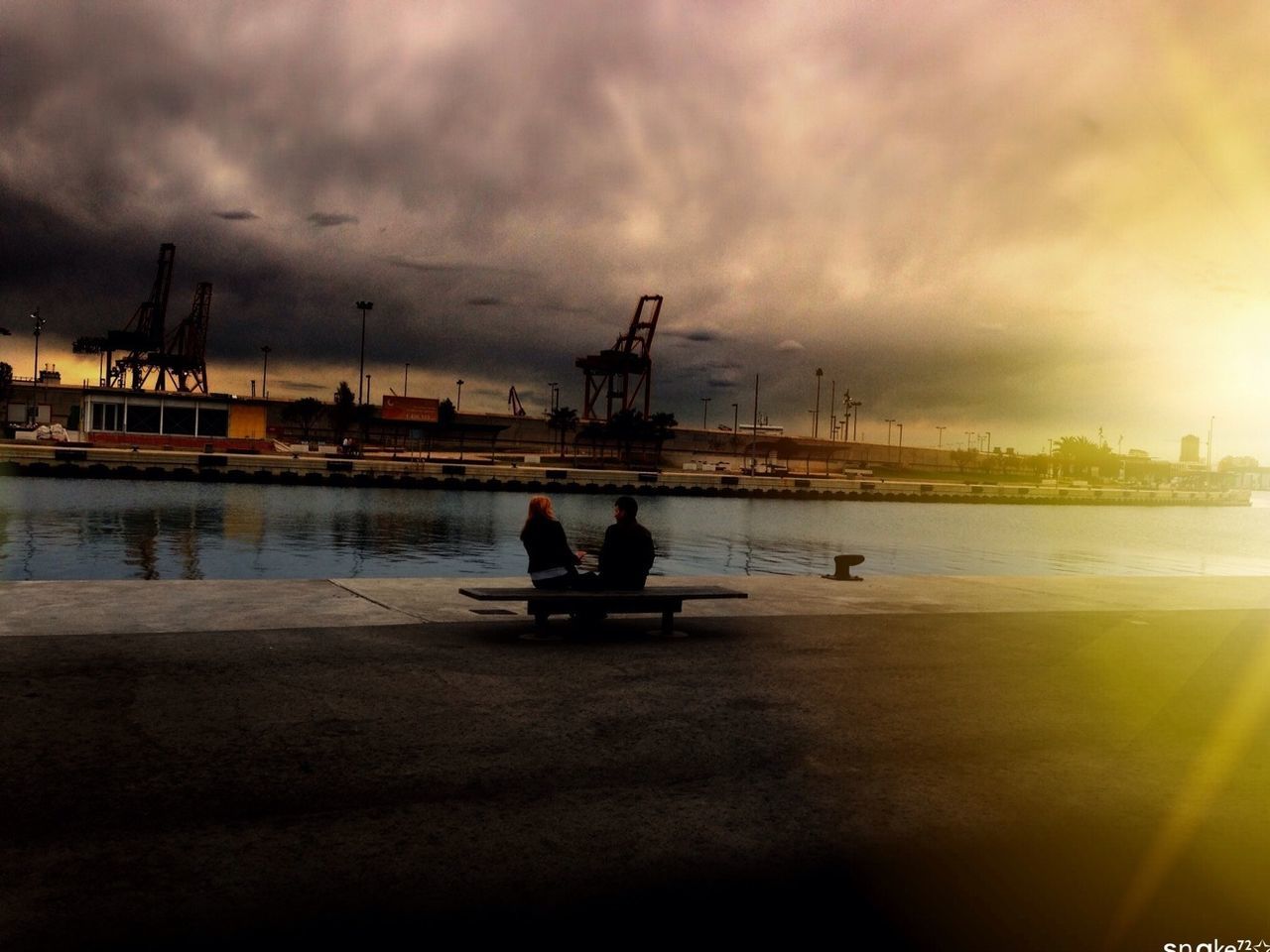 sky, water, nautical vessel, cloud - sky, lifestyles, rear view, men, leisure activity, transportation, sea, cloudy, sitting, mode of transport, boat, cloud, person, standing