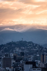 Cityscape against sky during sunset