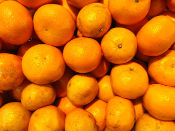 Full frame shot of oranges in market