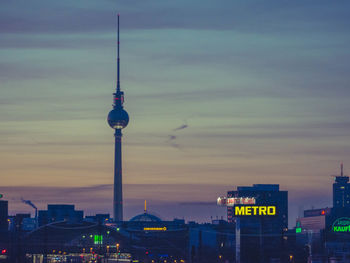 View of communications tower at sunset