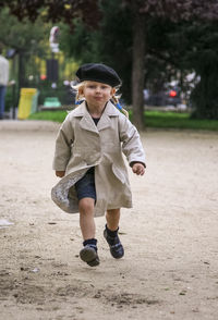 Portrait of cute girl walking at playground