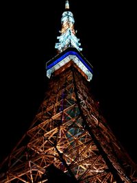 Low angle view of illuminated tower