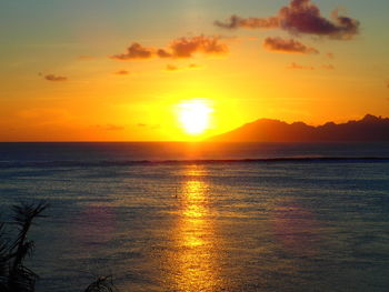 Scenic view of sea at sunset