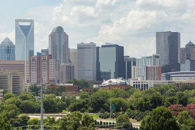 Buildings in city against sky