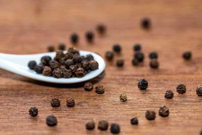 Close-up of coffee beans on table