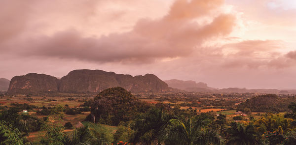 Scenic view of landscape against sky during sunset