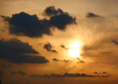 Low angle view of dramatic sky during sunset