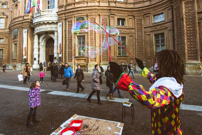 People in front of building