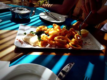 Close-up of food served on table