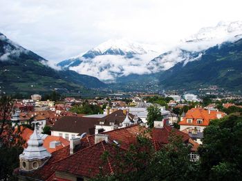 High angle view of town against mountains