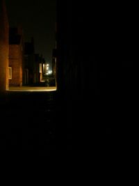 View of buildings in city at night