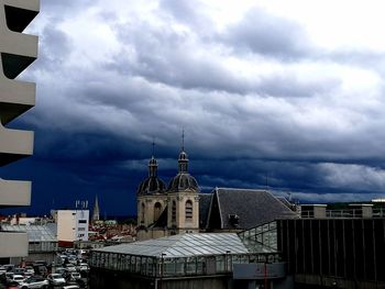 View of bell tower against cloudy sky