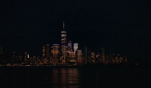 Illuminated buildings in city at night