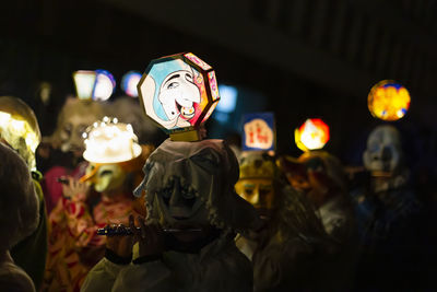 Illuminated lanterns at night