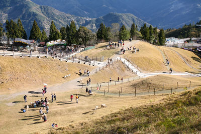 High angle view of people on mountain road