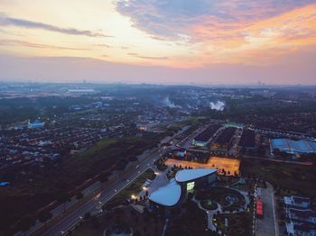 High angle view of cityscape against sky during sunset