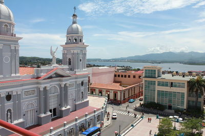 High angle view of buildings in city against sky