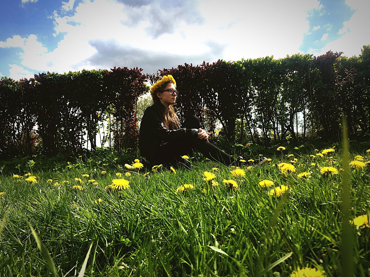 one person, sky, flower, growth, nature, field, outdoors, yellow, sunflower, mature adult, day, plant, tree, tranquility, full length, landscape, beauty in nature, real people, grass, freshness, adult, people