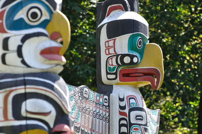Close up of totem poles