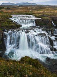 Scenic view of waterfall. beautiful powerful reykjafoss in iceland