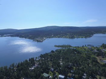 High angle view of lake against clear blue sky