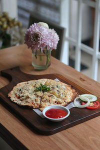 Close-up of breakfast served on table