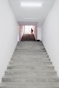 Woman walking on stairs