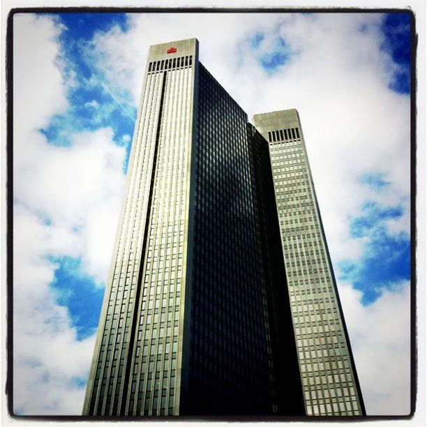 architecture, low angle view, built structure, building exterior, sky, modern, office building, skyscraper, tall - high, cloud - sky, transfer print, tower, cloud, city, tall, auto post production filter, cloudy, building, glass - material, day