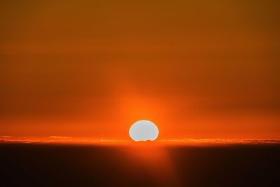 Scenic view of silhouette landscape against romantic sky at sunset