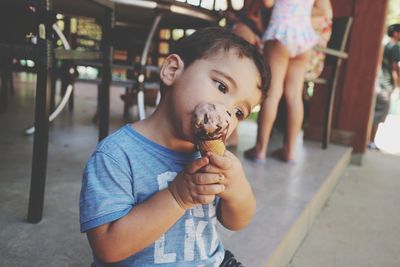 Cute girl eating ice cream