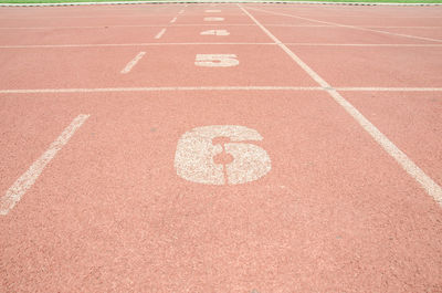 High angle view of numbers on running track