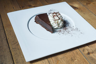 High angle view of cake in plate on table